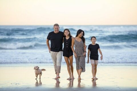 a Happy melbourne family at saint Kilda beach